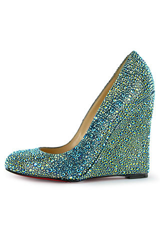 Here is another proposition from fall/winter 2009 collection from Christian Louboutin. This wedge has Swarovski crystals. It’s all sparkly and it might be a great shoe for New Year’s Eve.