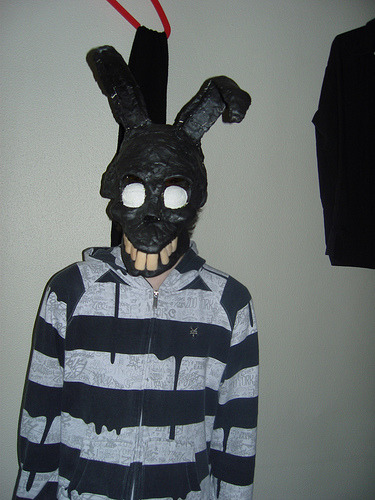 I think it's inspired by the costume that Frank wears in Donnie Darko
