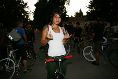 Cute girl. Tattoos. Bikes. Ridiculous aerospoke wheel in the