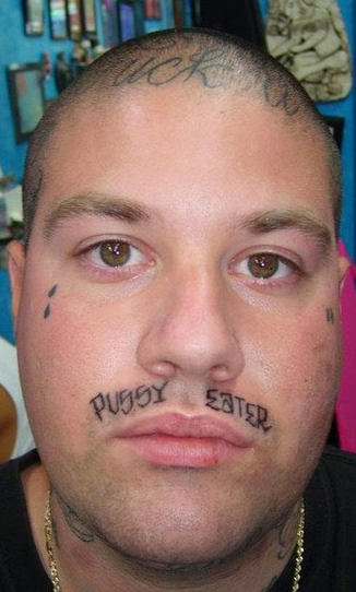 jesus face tattoos. i want to punch this idiot in