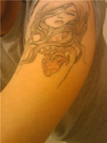 Its an artwork of Audrey Kawaski, My first tattoo.