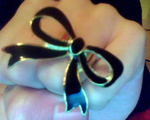 beforehecheats:my new bow ring &lt;3