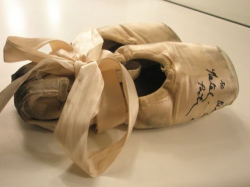 Natalie Portman, signed the ballet slippers she wore during her upcoming 