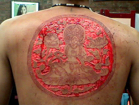 Huge back scarification. by Tattoos Excite Me!