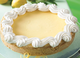 celebratewithcake:

sweettoothgirl:

Lemon Cheesecake
Cake mix is the secret to an easy press-in-the-pan crust and a foolproof cream cheese filling.
Prep Time: 15 min / Total Time: 6 hours 50 min / Makes: 16 servings
Ingredients:
Crust:

1 box Betty Crocker SuperMoist yellow cake mix
1/2 cup butter or margarine, softened
1 teaspoon grated lemon peel

Filling:

2 packages (8 oz each) cream cheese, softened
3/4 cup sugar
3 containers (3.5 oz each) lemon pudding (from 4-pack container)
1/2 cup sour cream
3 eggs
2 cups frozen (thawed) whipped topping

Directions:

Heat oven to 300 degreesF. Spray bottom and side of 10-inch springform pan with baking spray with flour. Wrap foil around the outside of pan to catch drips. Reserve 1/4 cup of the cake mix; set aside. In large bowl, beat remaining cake mix, butter and lemon peel with electric mixer on low speed until crumbly. Press in bottom and 1 1/2 inches up side of pan.
In same large bowl, beat reserved cake mix, the cream cheese, sugar, pudding and sour cream on medium speed until smooth and creamy. Beat in eggs, on at a time, until mixed. Pour over crust.
Bake 1 hour 20 minutes to 1 hour 35 minutes or until edges are set but center of cheesecake jiggles slightly when moved. Turn oven off; open oven door at least 4 inches. Leave cheesecake in oven 30 minutes longer.
Remove cheesecake from oven; place on cooling rack. Without relesing side of pan, run knife around edge of pan to loosen cheesecake. Cool in pan on cooling rack 30 minutes. Cover loosely; refrigerate 4 hours or overnight. Remove side of pan before serving. Pipe pr spoon whipped topping around outside edge of cheesecake. Store in refrigerator.

High Altitude (3500-6500 ft): Heat oven to 325 degreesF.
Subtitution: If you don’t have fresh lemon to grate peel for the crust, just omit it. There is still plenty of lemon flavor in the cheesecake.
How-To: For clean cuts when serving the cheesecake, dip a sharp knife in hot water and dry on a paper towl before each cut.
Nutrition Information:
1 Serving: Calories 400 (Calories from Fat 210); Total Fat 23g (Saturated Fat 14g, Trans Fat 1 1/2g);Cholesterol 90mg; Sodium 380mg; Total Carbohydrate 43g (Dietary Fiber 0g, Sugars 30g); Protein5g Percent Daily Value*: Vitamin A 15%; Vitamin C 0%; Calcium 10%; Iron 6% Exchanges: 1/2 Starch; 2 1/2 Other Carbohydrate; 0 Vegetable; 1/2 High-Fat Meat; 3 1/2 Fat Carbohydrate Choices: 3 *Percent Daily Values are based on a 2,000 calorie diet.

Website | Recommend | Submit | Ask | Apparel