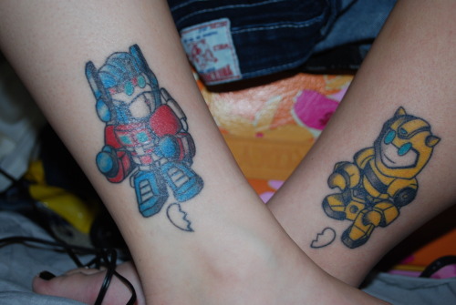 My best friend and I 8217s matching tattoos Baby Optimus Prime and
