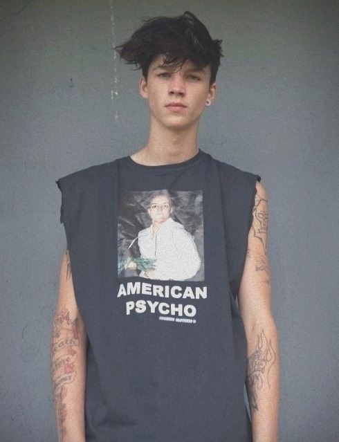 bisousbitches:  American Psycho.I would like that tshirt.