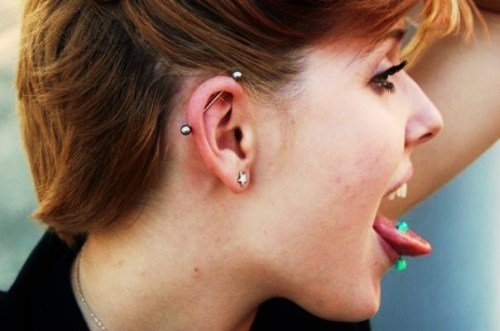 industrial ear piercing. Tongue and Industrial Piercing
