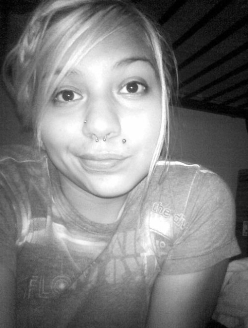 Face: Double nose piercing(18g), septum(18g), and monroe(14g).