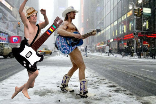 @tamskee80  Naked Guitar Hero vs Naked Cowboy

——-

Jumping Rob knows how to rock the city.
