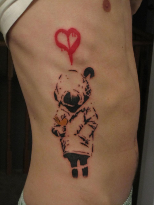 This is my brother's Banksy tattoo I showed him Bansky's art a couple of