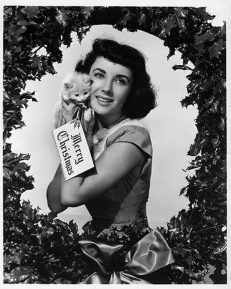 
mothgirlwings:  Elizabeth Taylor and a little friend, Christmas, 1950s
