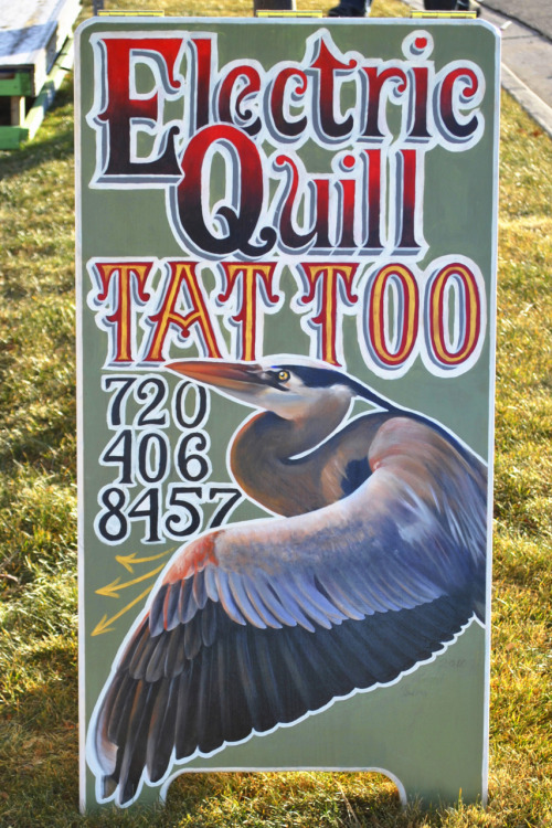 painted sandwich board for our new shop in boulder electric quill tattoo