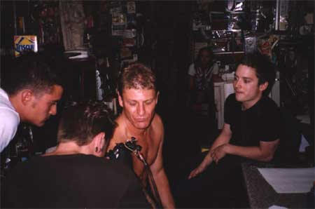 Another picture I found of Sean Bean getting his Elvish tattoo 82209