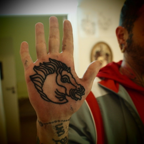guyletatooer palm tattoo done in berlin on john