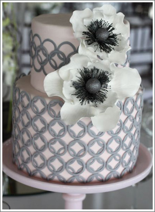 Pink gray and white wedding cake with anemone sugar flower cake topper