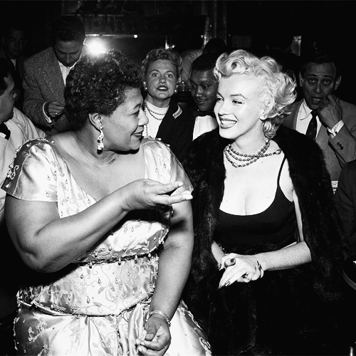 bibliofeminista:

“I owe Marilyn Monroe a real debt…it was because of her that I played the Mocambo, a very popular nightclub in the ’50s. She personally called the owner of the Mocambo, and told him she wanted me booked immediately, and if he would do it, she would take a front table every night. She told him - and it was true, due to Marilyn’s superstar status - that the press would go wild. The owner said yes, and Marilyn was there, front table, every night. The press went overboard. After that, I never had to play a small jazz club again. She was an unusual woman - a little ahead of her times. And she didn’t know it.” - Ella Fitzgerald
