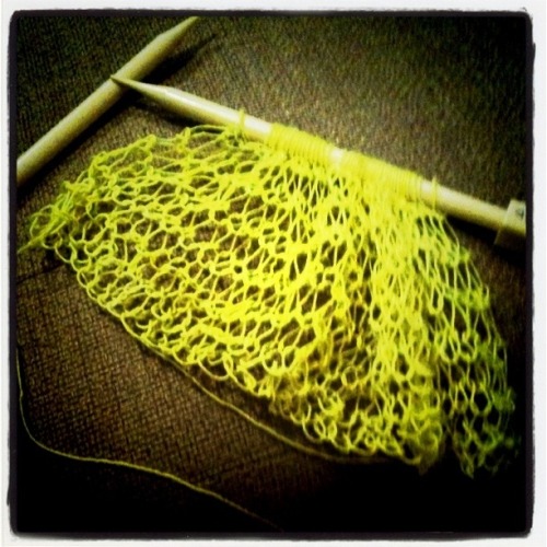 I been knitting, yo. I hope the neon-ness of this yarn comes through.