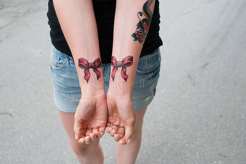 bow tattoos on wrist