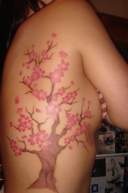 cherry blossom tree tattoo on back. cherry blossom tree tattoos