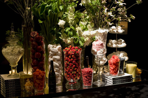 Sophisticated candy buffet love the tall apothecary jars used to hold 