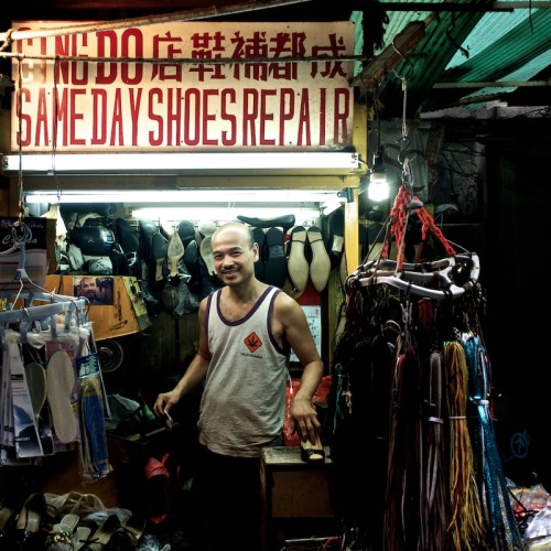 Mr. Wong Sun, the happy shoe repairsman