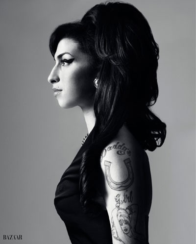 sisterspock 19832011 A black and white photograph of Amy Winehouse in 