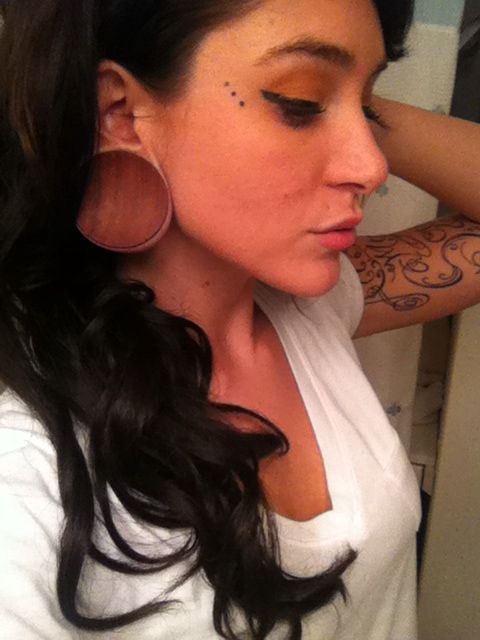Modified Women Two Inch Lobes Dot Work Face Tattoo The