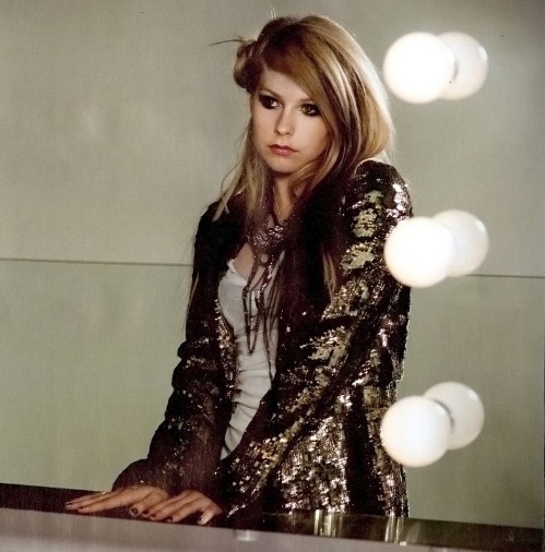 2 rare photos of Avril Lavigne by Elle Up Seen on Elle SI in 2008