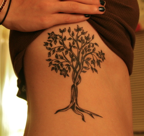 My first tattoo on my ribs It's a tree of life based from Revelations 27 