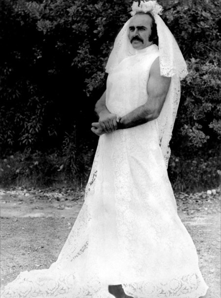 Sean Connery in a wedding dress on the set of Zardoz