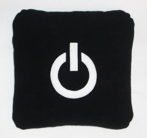 (via Power Button Pillow by iconpillows on Etsy)