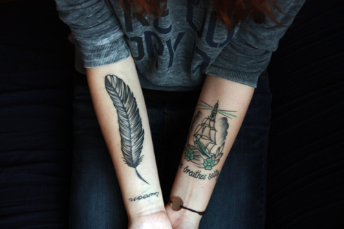 The tattoo on the left is my