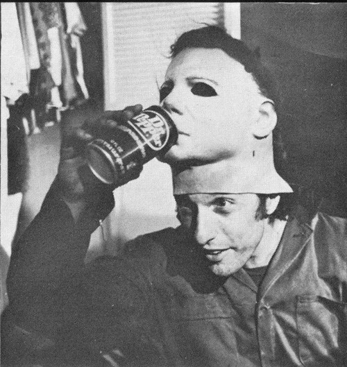 Nick Castle who portrays'The Shape' Michael Myers taking a break on the