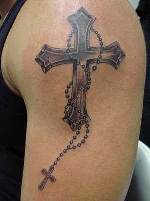 cross and rosary on back first tattoojpg 30175 bytes click to enlarge