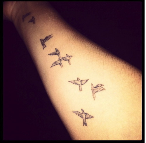 because normally when you see bird tattoos they're just filled in black