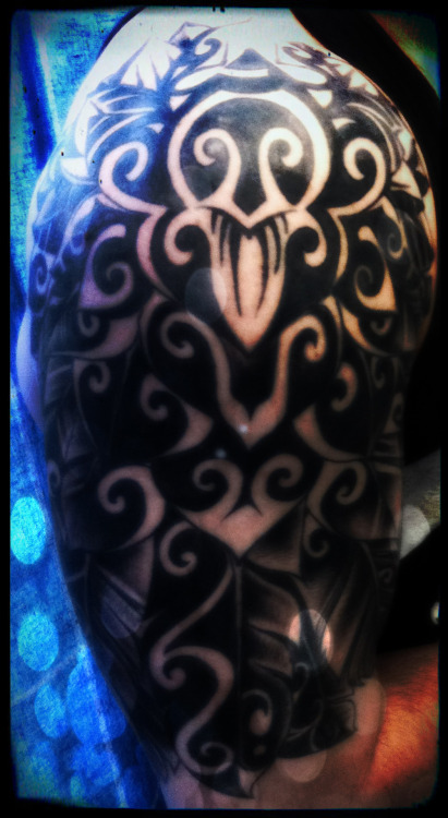 original tattoo was a maori face in a lotus flower on the shoulder new