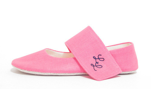 A pair of made to measure customized bridal ballet flats in pink and off 