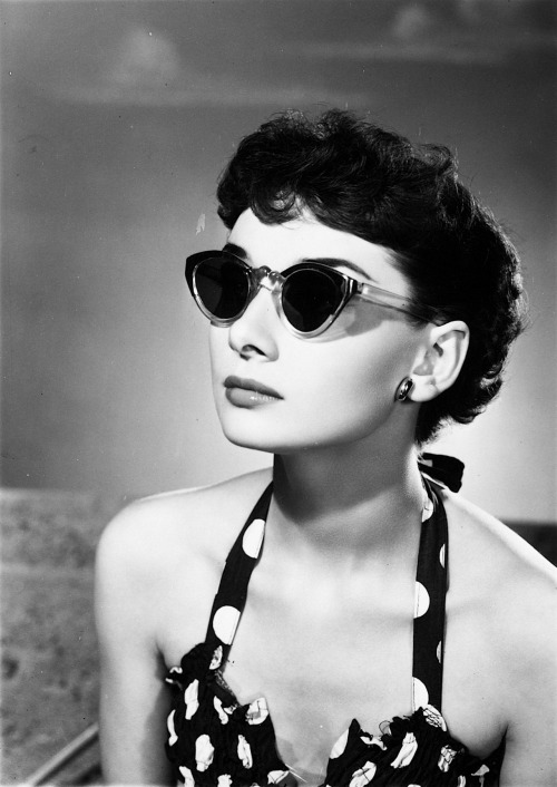 Audrey Hepburn in sunglasses photographed by Angus