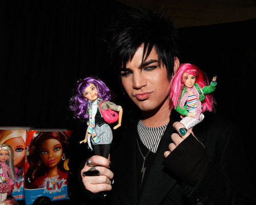 to celebrate the dawning of the new year, we’re giving you adam lambert, his duckface, and some bratz doll knockoffs. we’re keeping all the cheap champagne for ourselves. HAPPY FUCKING 2010, EVERYONE!!!
