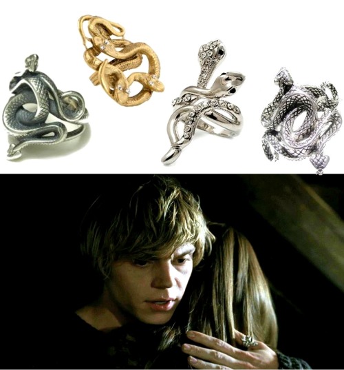 american-horror-fashion: Requested: Intertwined sliver snake ring worn by Tate Langdon throughout several episodes.(From right to left) 1. Ring Snake -modekungen.com $48.702. Yochi Snake Ring -pinkmascara.com $38.003. Diamante Rhodium Plated Swirl Snake -amazon.com $16.944. Intertwined Snake Ring -ytc925.com $5.00 P.S. I added a couple “girly” snake rings to the mix just in case someone doesn’t want such a “manly” ring. Also, if you would like to see a close-up version of Tate’s ring, click here. 